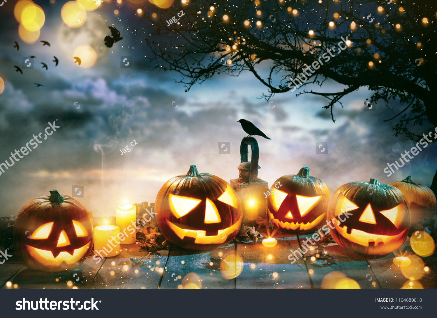 Spooky halloween pumpkins on wooden planks with dark horror background. Celebration theme, copyspace for text. #1164680818