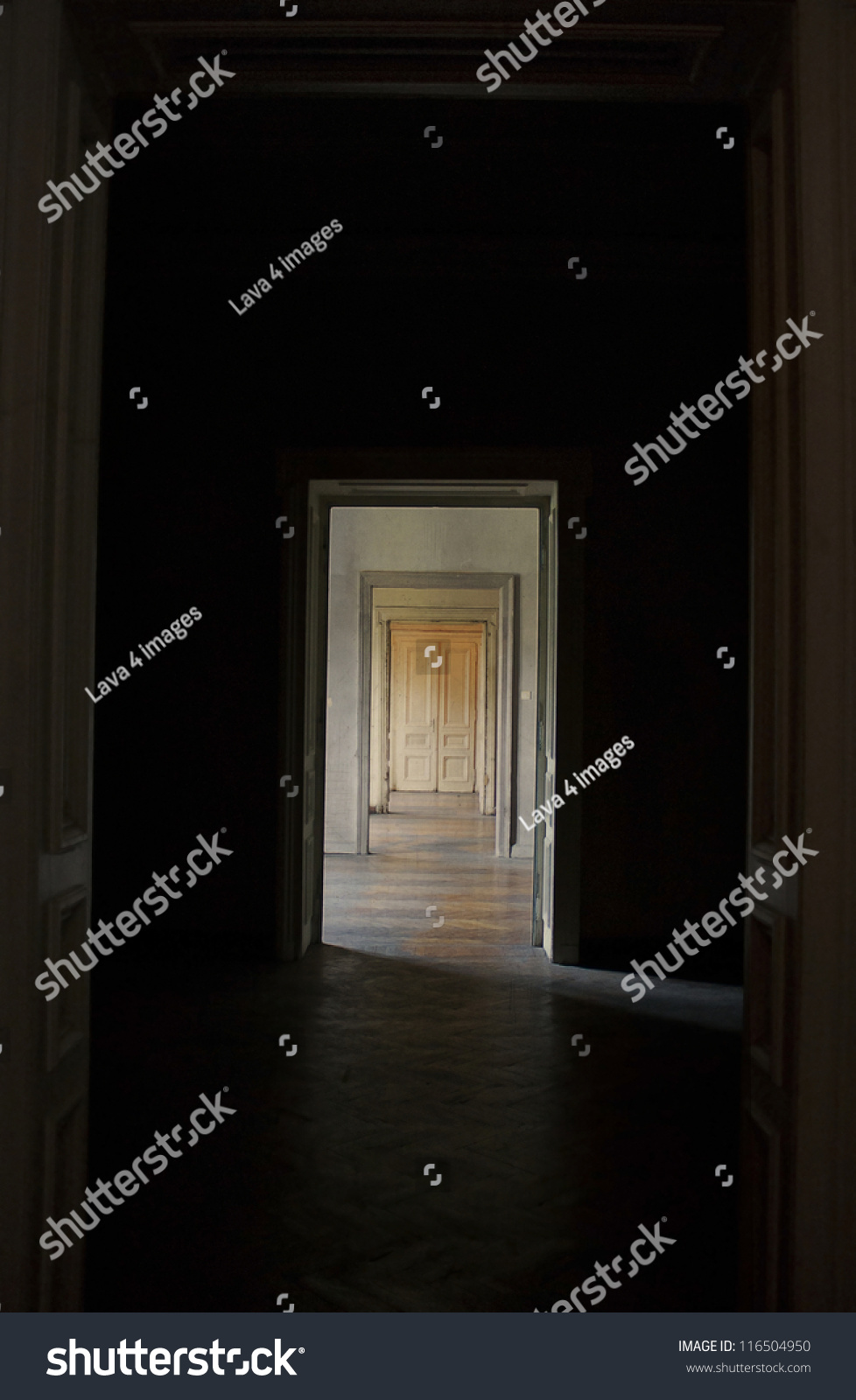 Closed door at the end of the hallway, rite of passage concept. Linear perspective view through several open doors and empty rooms. #116504950