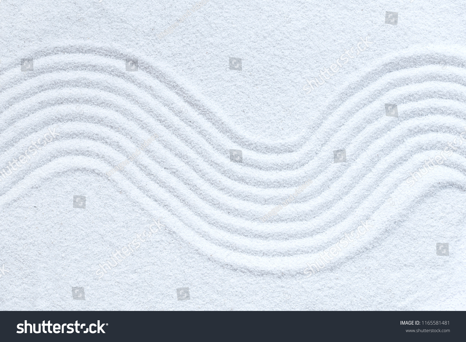 Zen pattern in white sand #1165581481