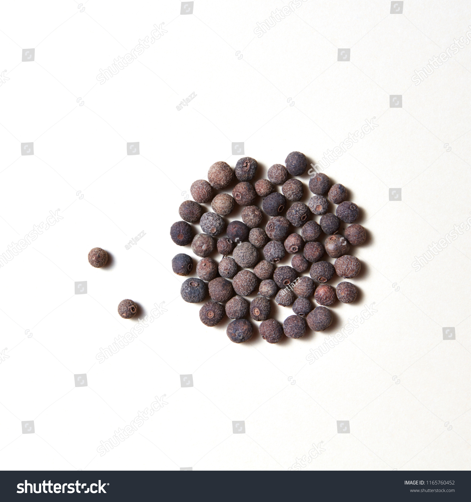 Dried whole allspice, jamaica peper - spice for culinary cooking isolated on white background with copy space. #1165760452