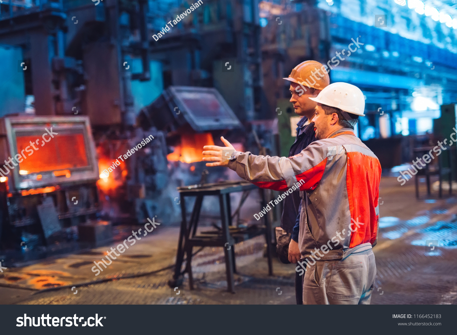 Workers in the steel mill. #1166452183