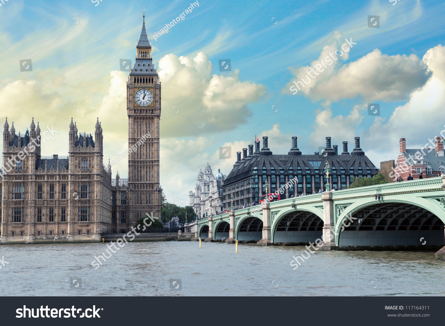 The Big Ben, the Houses of Parliament and Westminster Bridge in London. #117164311