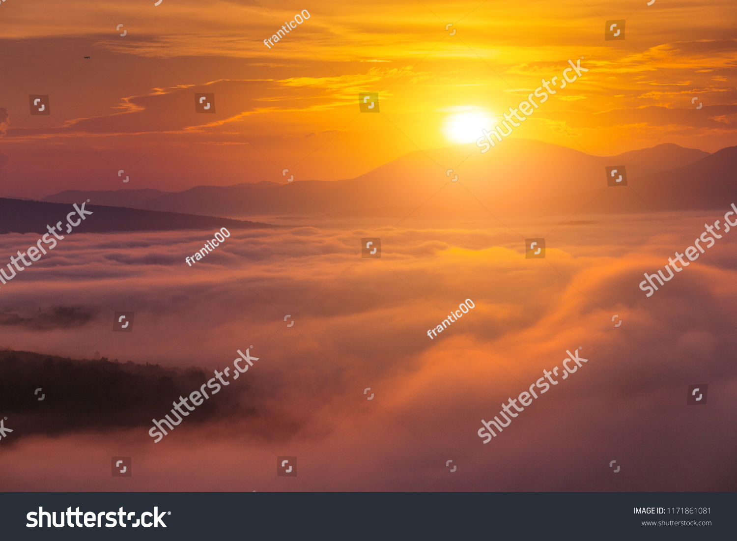 Colorful landscape in mountains with fog and sun #1171861081