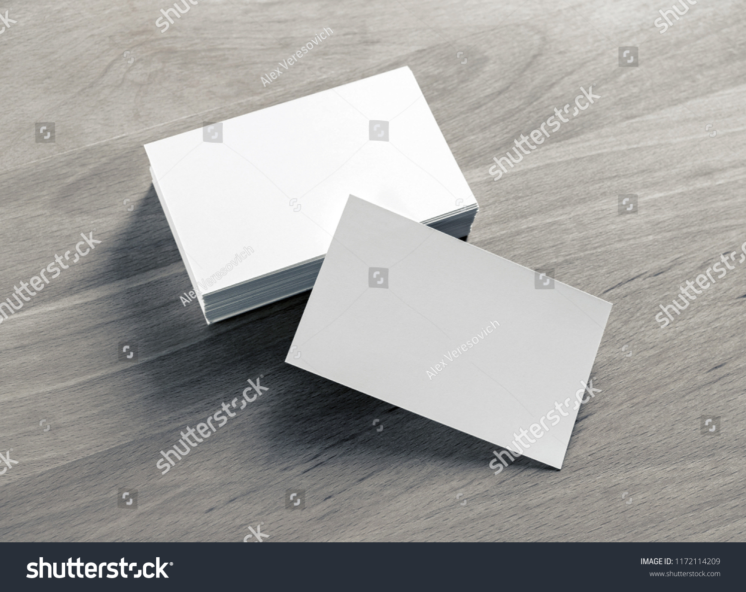 Blank white business cards on wood table background. Mockup for branding identity. #1172114209