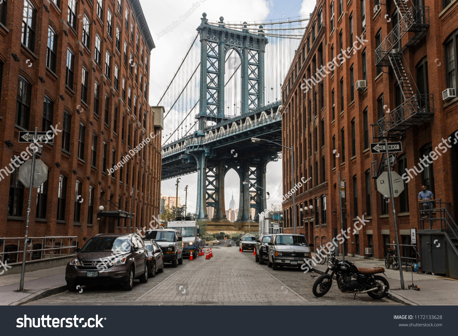 NEW YORK CITY - August 18, 2015: The Manhattan Bridge, a suspension bridge that crosses the East River connecting Lower Manhattan with Downtown Brooklyn, seen from Washington Street #1172133628