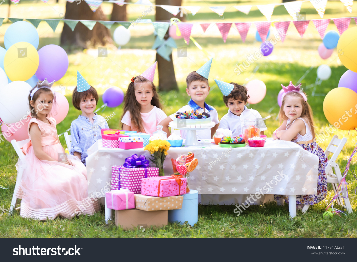 Cute children celebrating birthday outdoors #1173172231