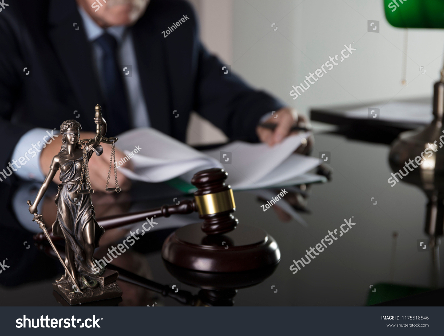 Law and justice concept. Male judge on gray background, statue of justice, gavel, bokeh. #1175518546