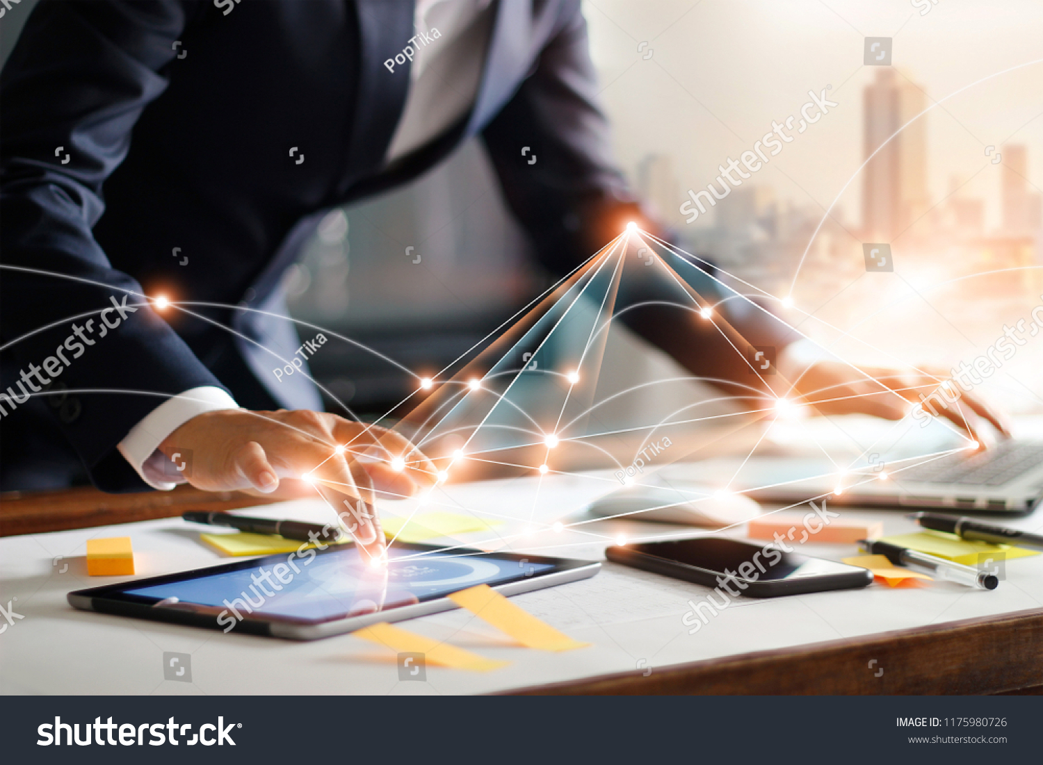 Businessman touching tablet and laptop. Management global structure networking and data exchanges customer connection on workplace. Business technology and digital marketing network concept. #1175980726