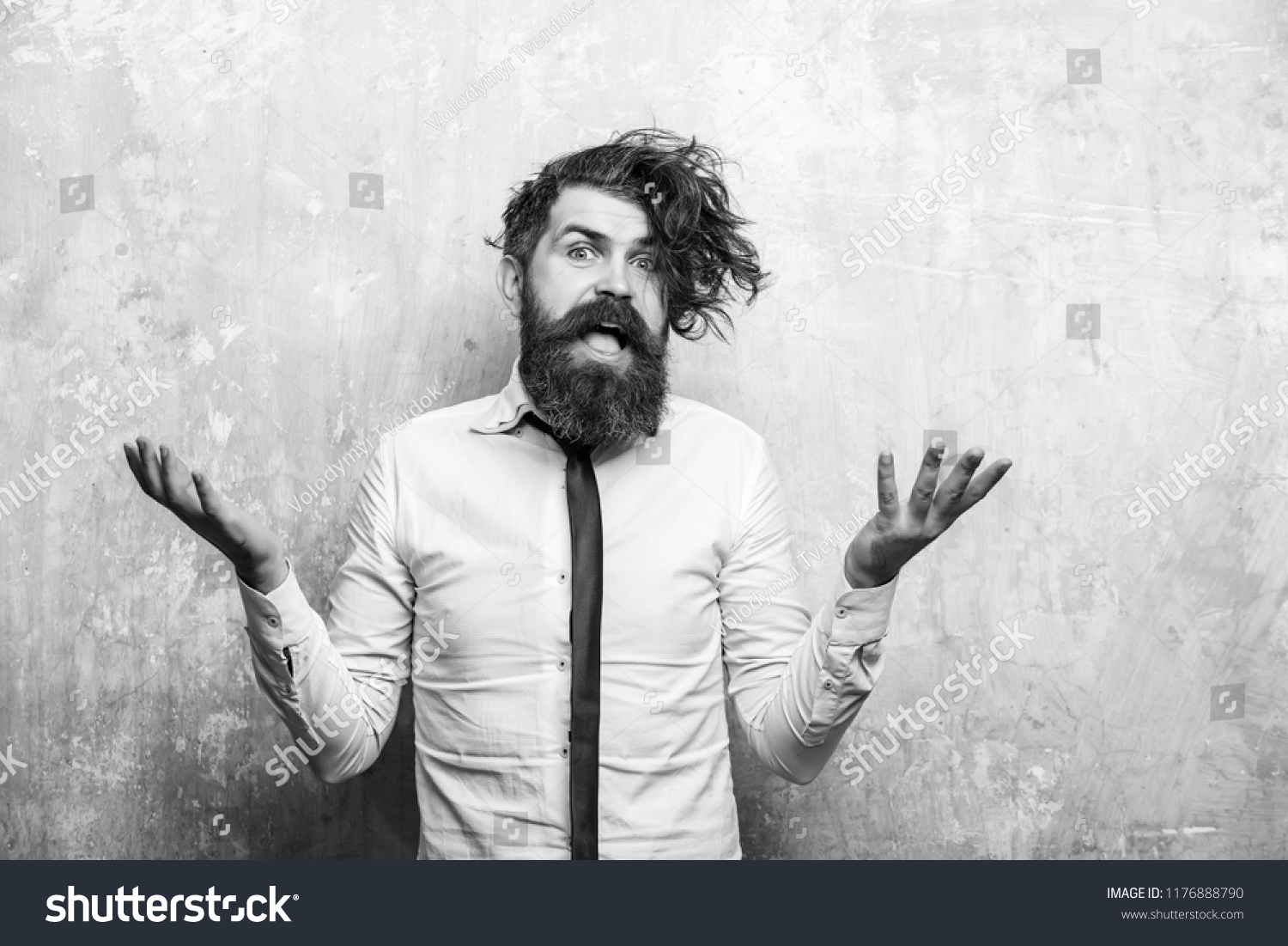 man or hipster with long beard and stylish hair on surprised happy face in tie and white shirt on textured beige background #1176888790