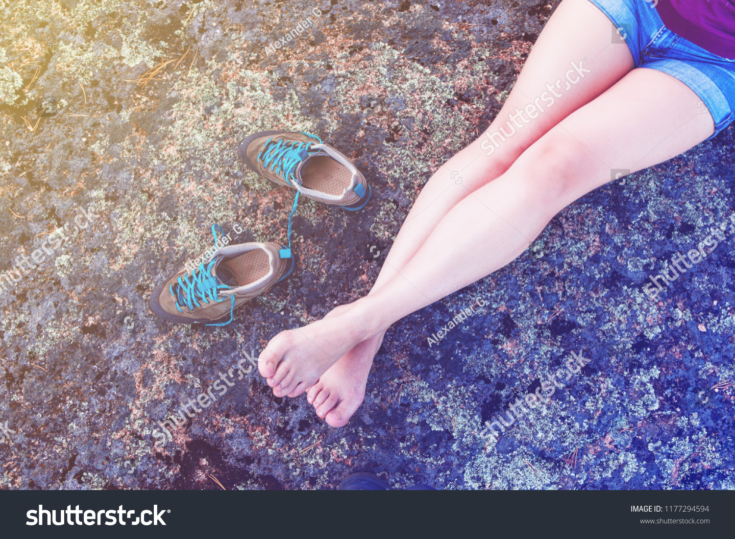 feet resting traveler without shoes, toned #1177294594