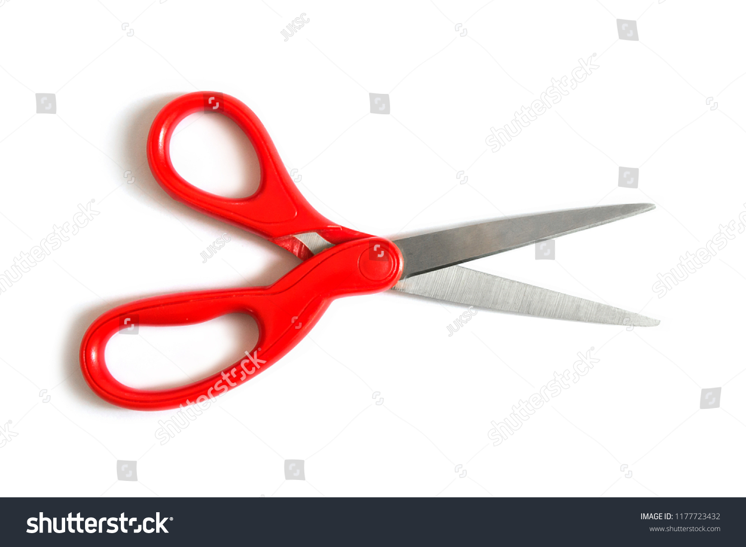 Red scissors isolated on white background #1177723432