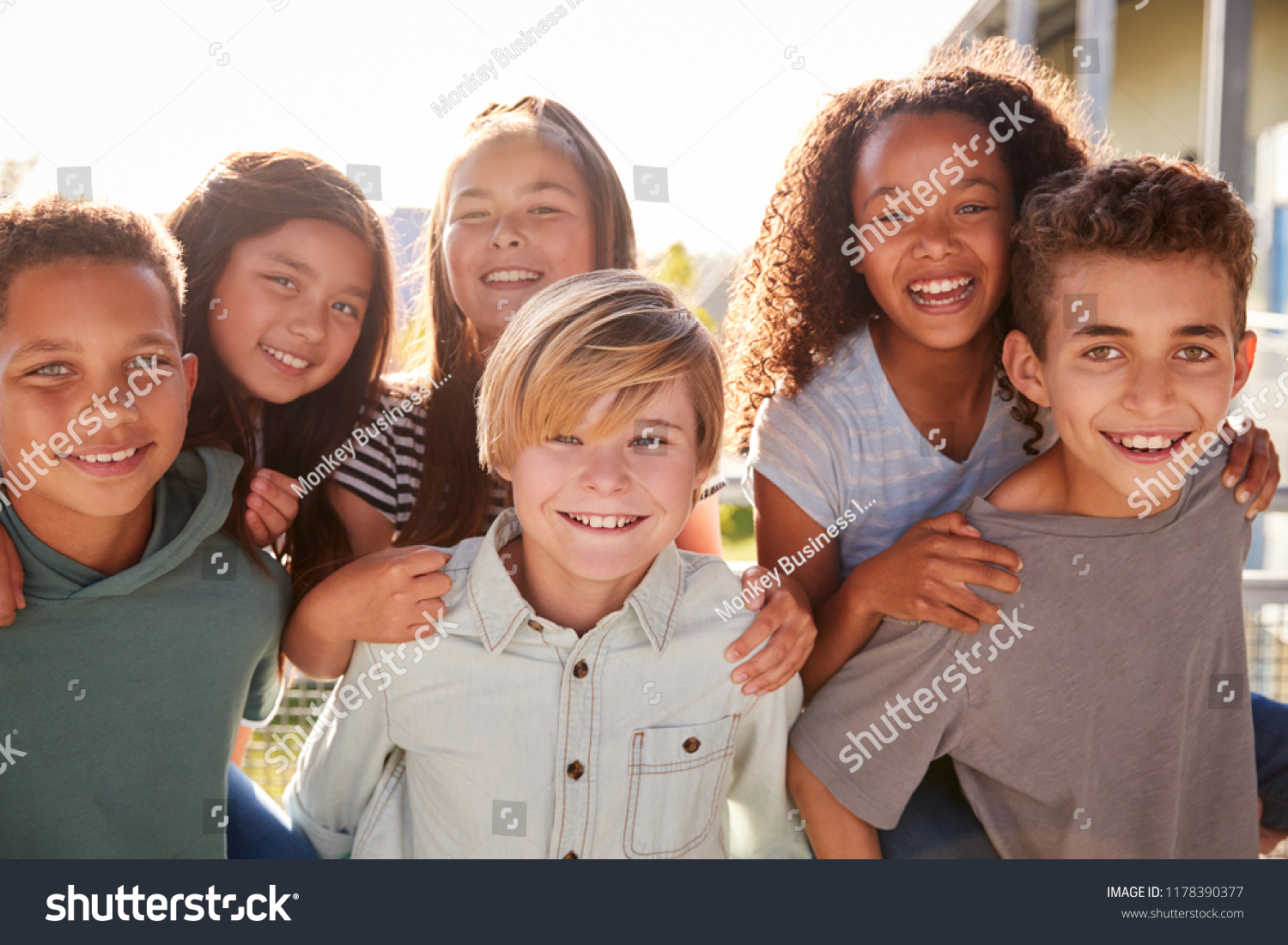 Elementary school kids smiling to camera during school break #1178390377