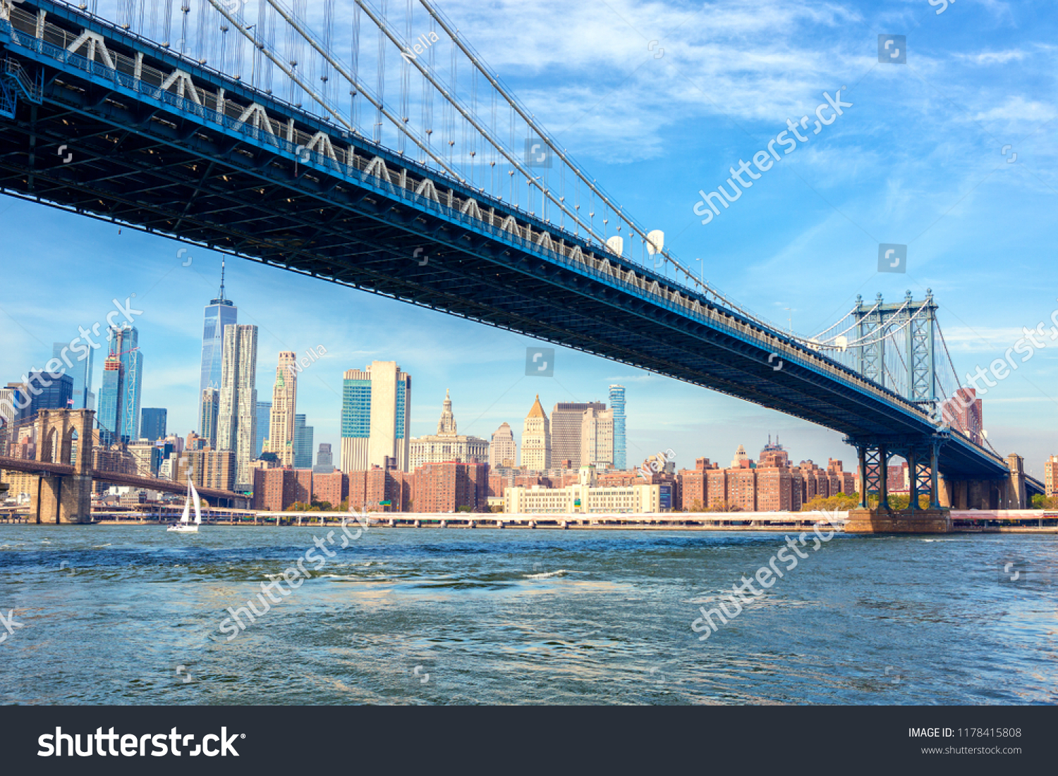 The Manhattan Bridge with  Manhattan in the background at the day-time, New York City, United States. #1178415808