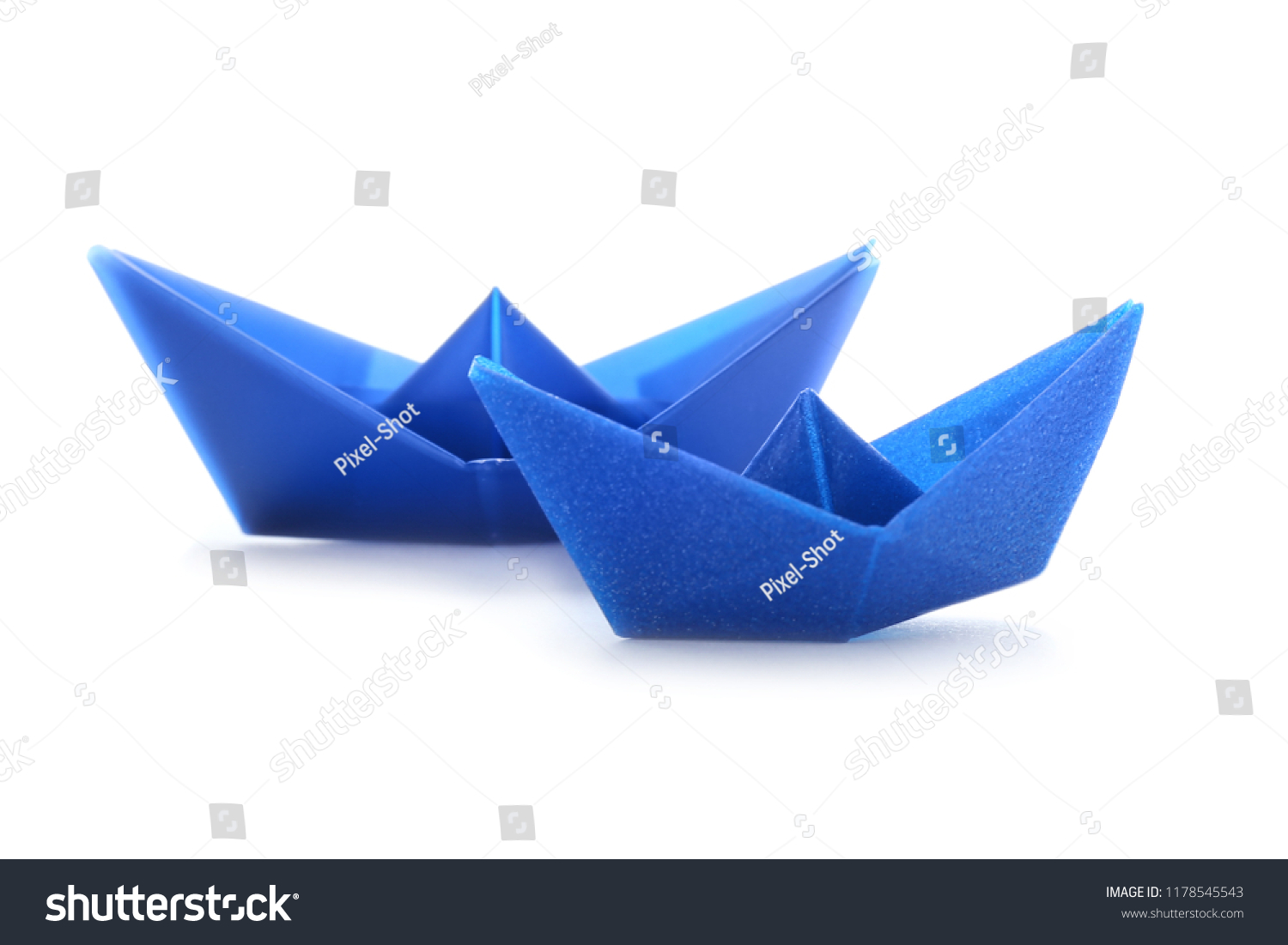 Origami boats on white background #1178545543