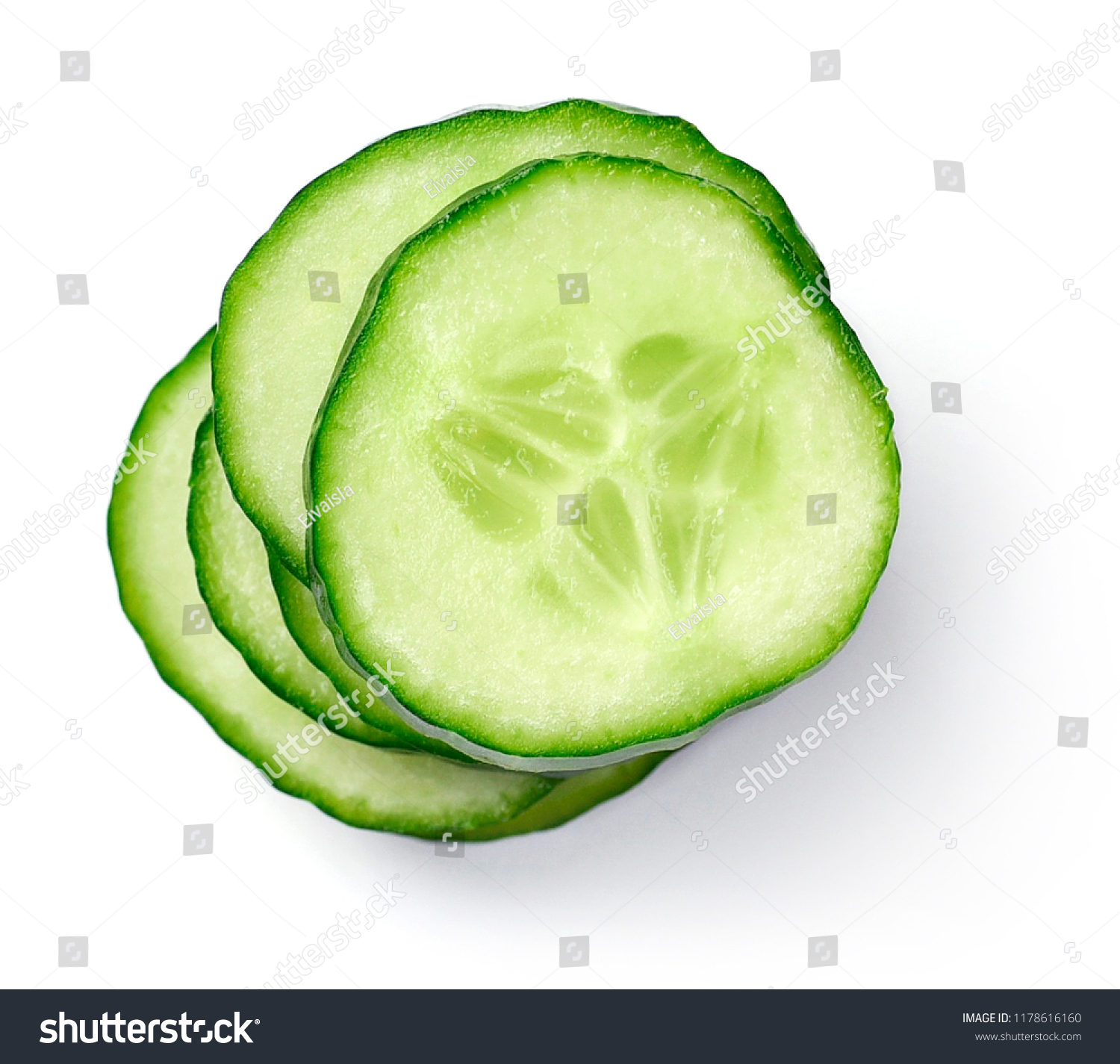 Fresh cucumber slices, isolated on white background. Close up shot of cucumber, arrangement or pile. #1178616160