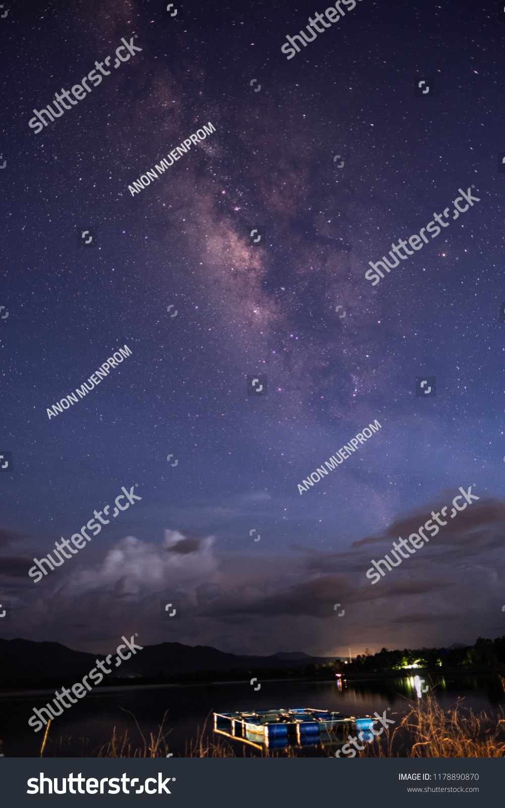Clouds, stars and the Milky Way in the night sky. #1178890870