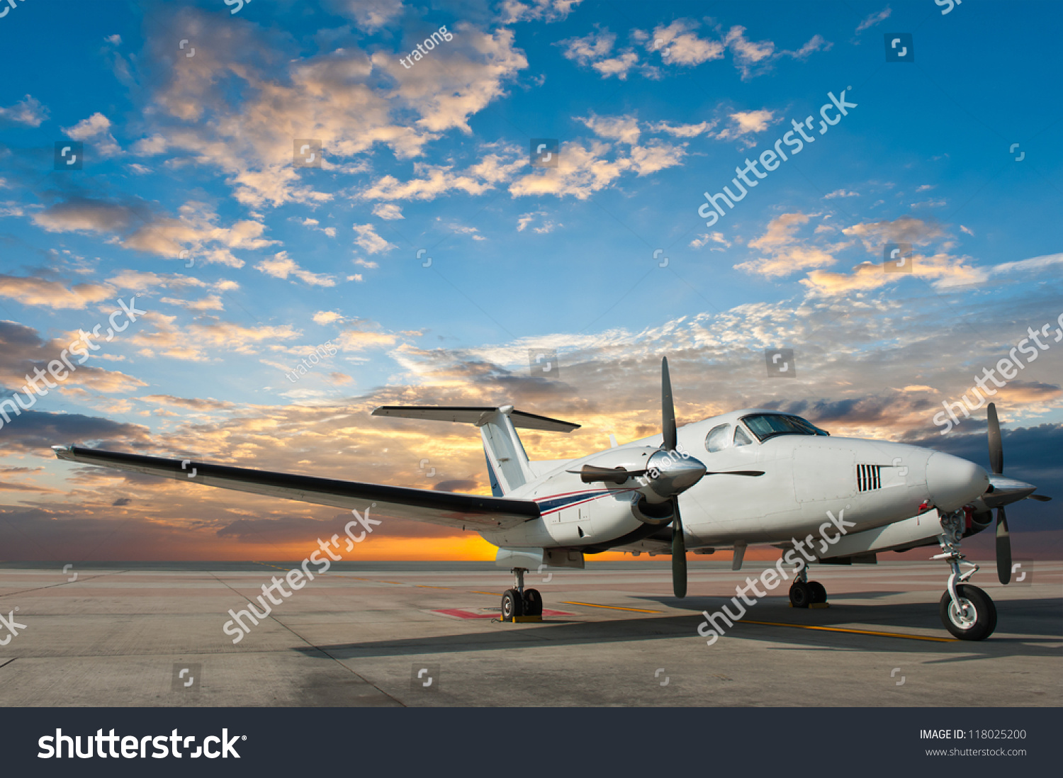 Propeller plane parking at the airport #118025200