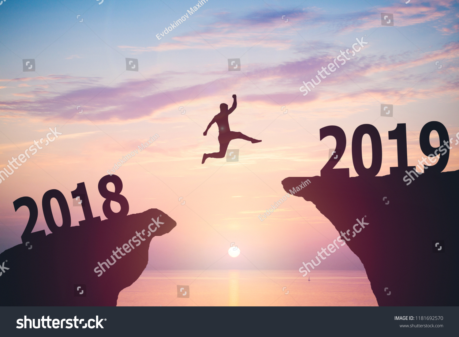 Silhouette of man jumping from 2017 to 2018 text #1181692570