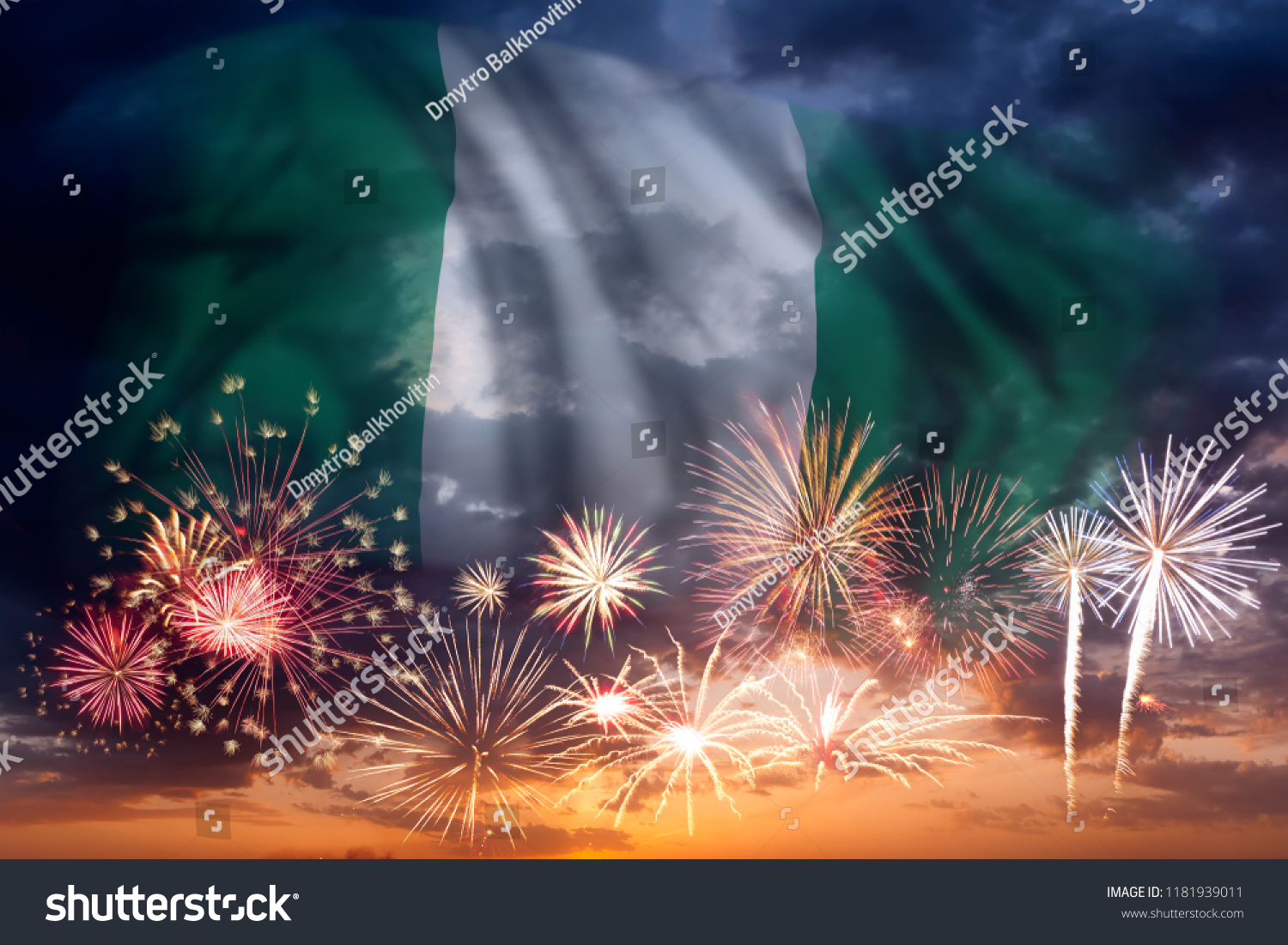 Holiday sky with fireworks and flag of Nigeria, independence day #1181939011