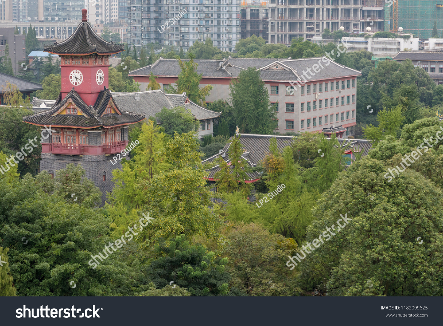 Chengdu, Sichuan Province, China - Sept 17, 2017 : Clock tower of Huaxi West China University of Medical Sciences aerial view #1182099625