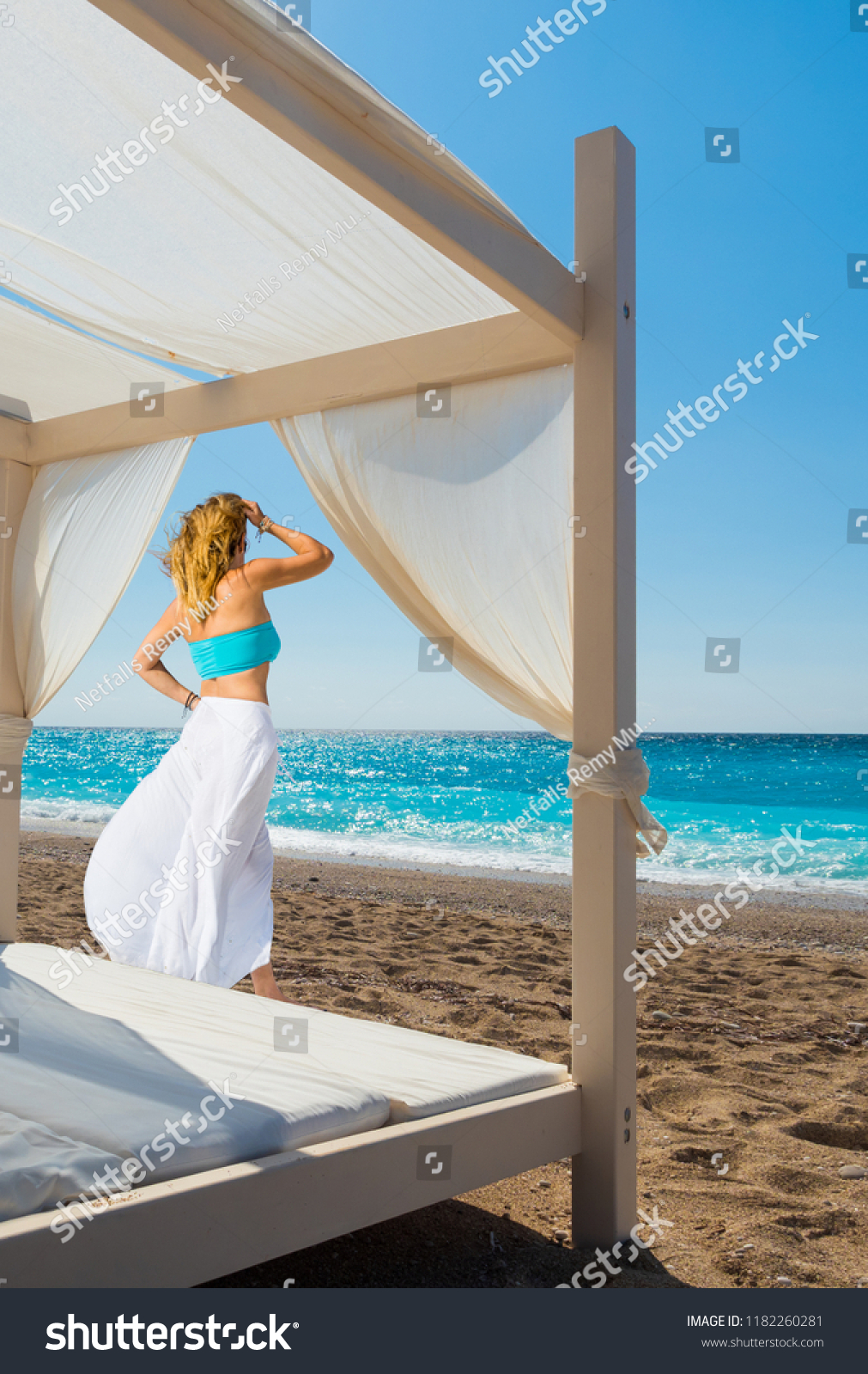 Woman suntanning - summer holidays at the tropical beach #1182260281