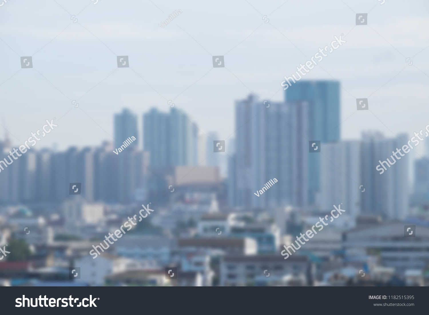 Blur background of skyscraper building condominium apartment office and residential in big city. #1182515395