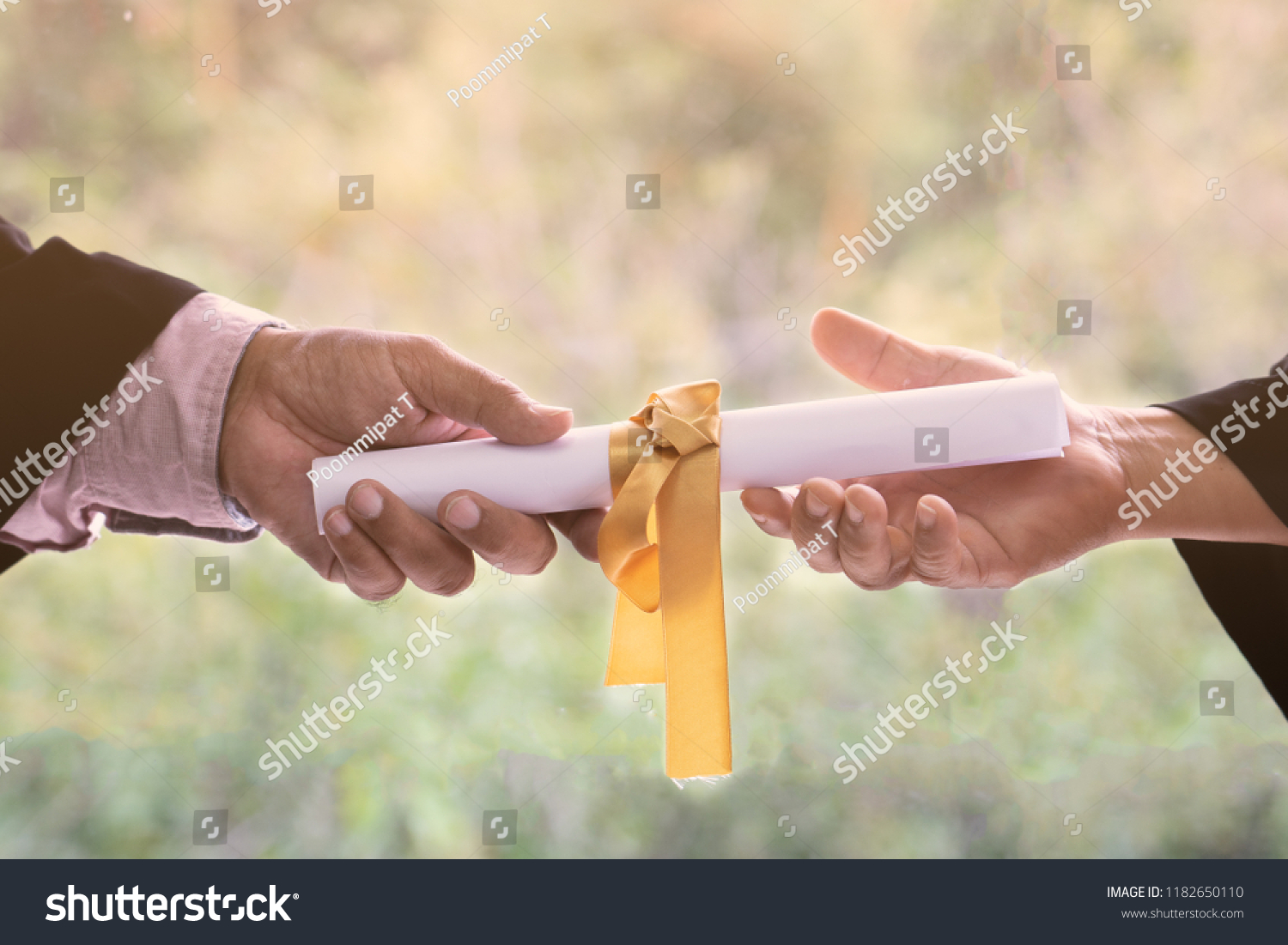 Give and Recieved. The Professor sending a roll of certificated card to the student. #1182650110