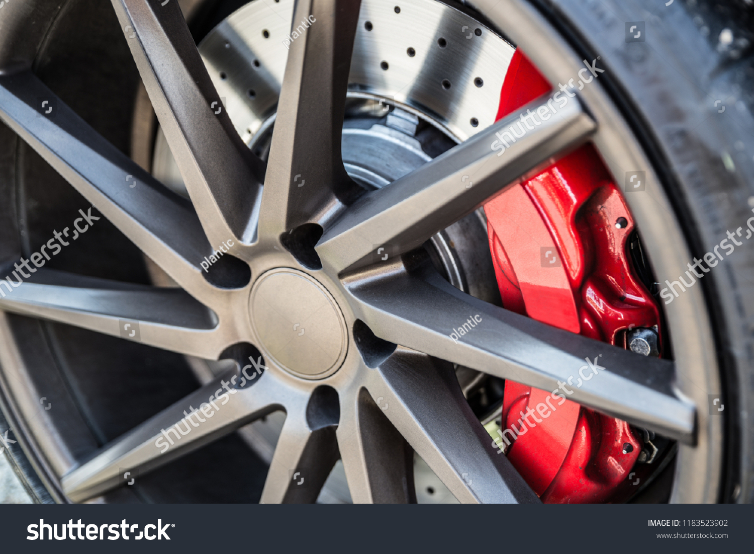 Sports car braking system. Disc brake and brake caliper #1183523902