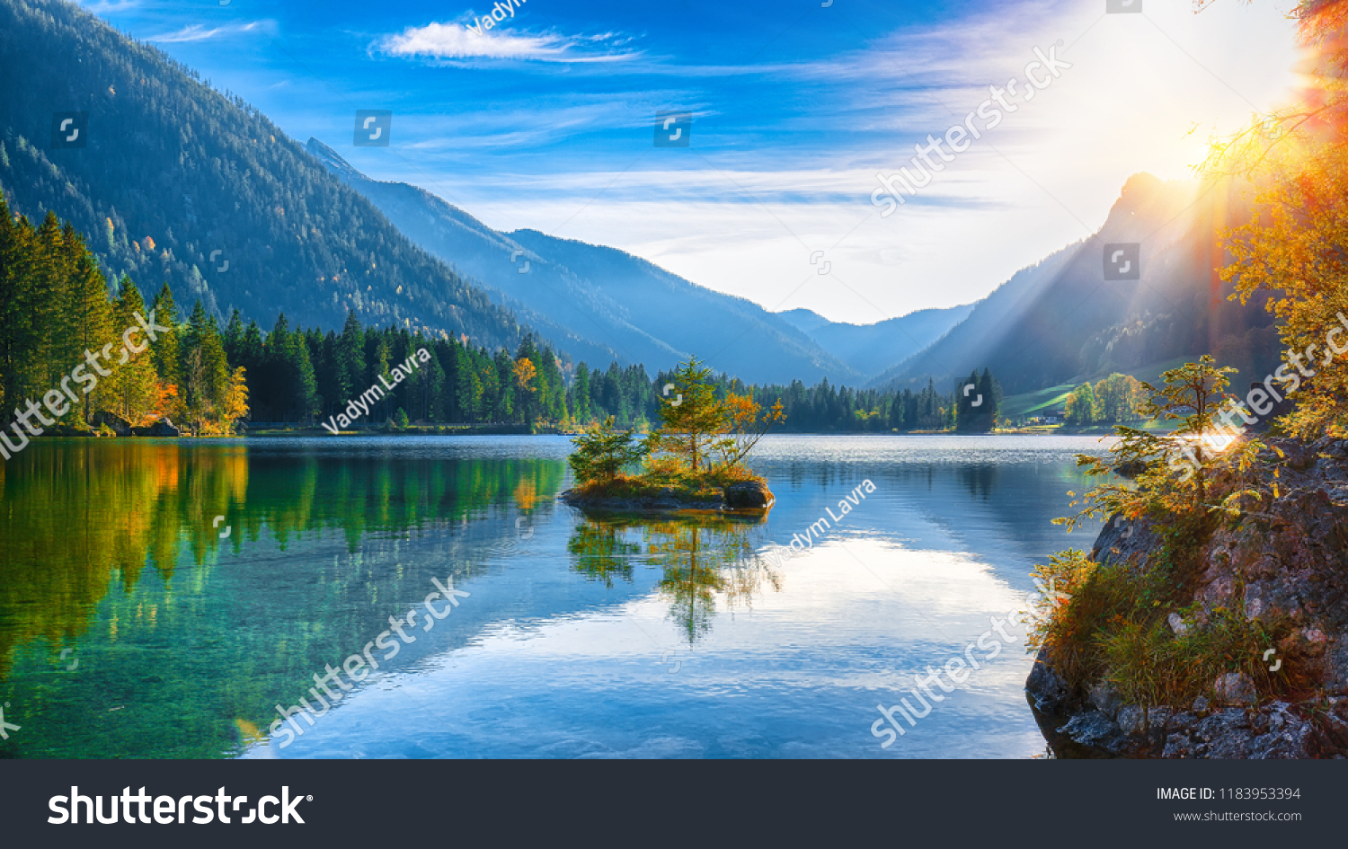 Fantastic autumn sunset of Hintersee lake. Beautiful scene of trees on a rock island. Location: resort Ramsau, National park Berchtesgadener Land, Upper Bavaria, Germany Alps, Europe #1183953394