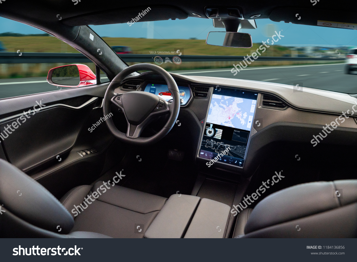 Self driving car on a road. Autonomous vehicle. Inside view. #1184136856