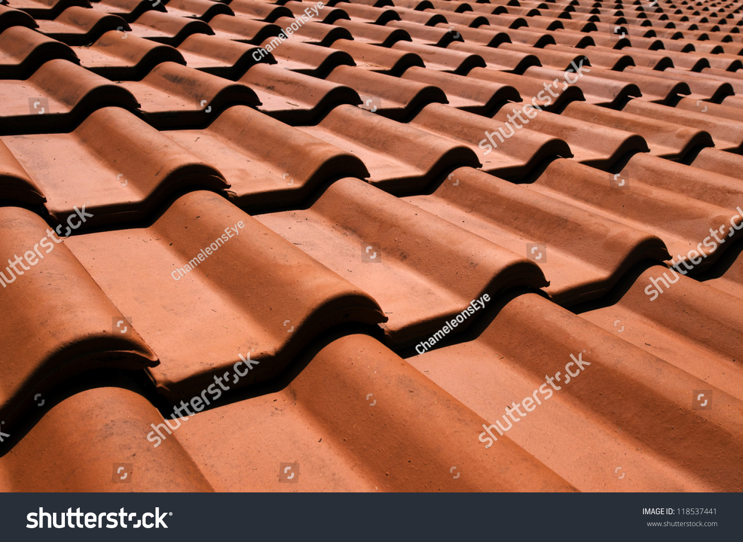 Spanish Terracotta tiled roof. Mediterranean architecture abstract background texture. No people. Copy space #118537441