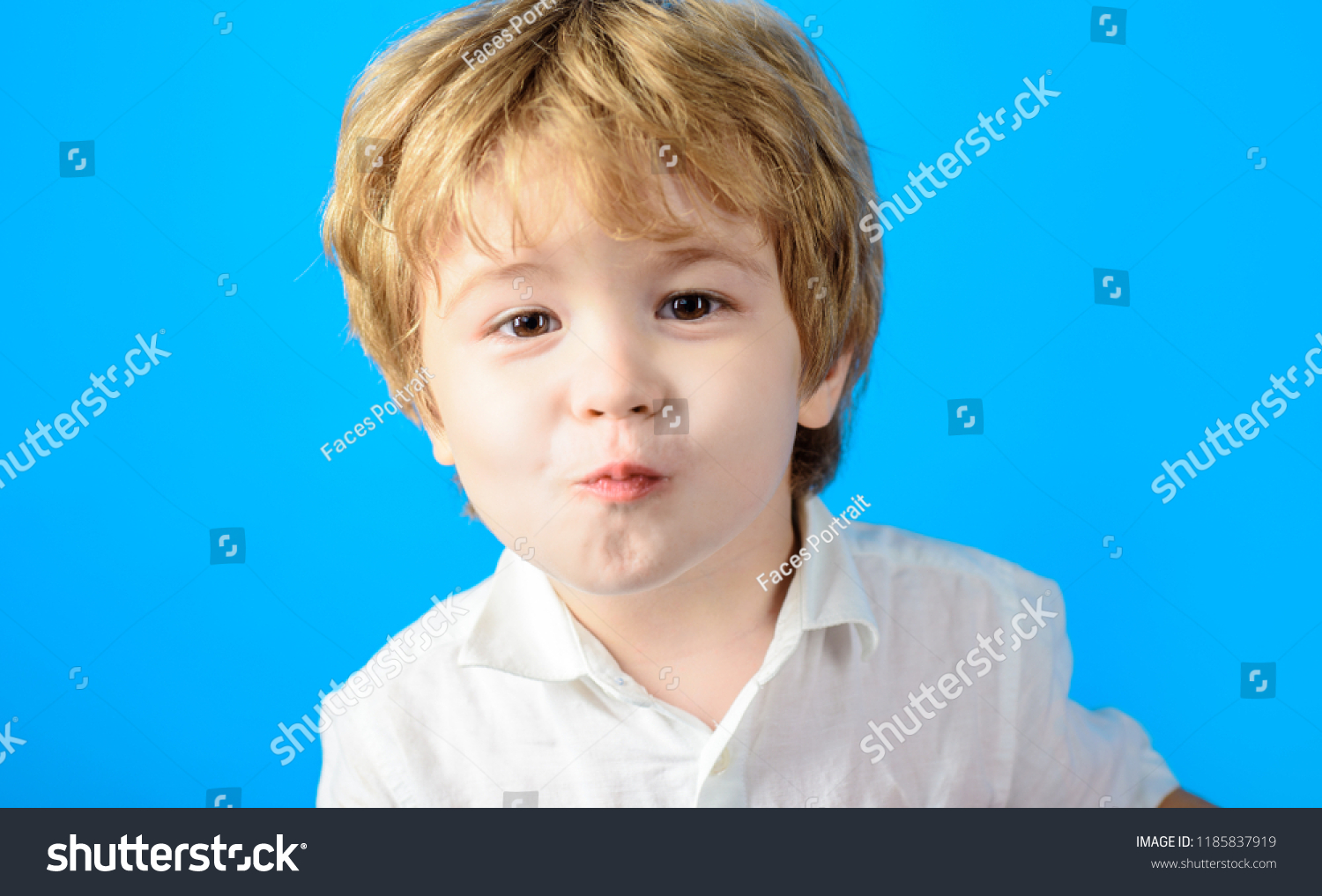 Kiss. Kissing. Cute little boy throwing kiss. Kissing child expressing love and affection. Emotions, sympathy, love, care. Adorable kid showing kiss to parent. Facial expressions. Ready to be kissed. #1185837919