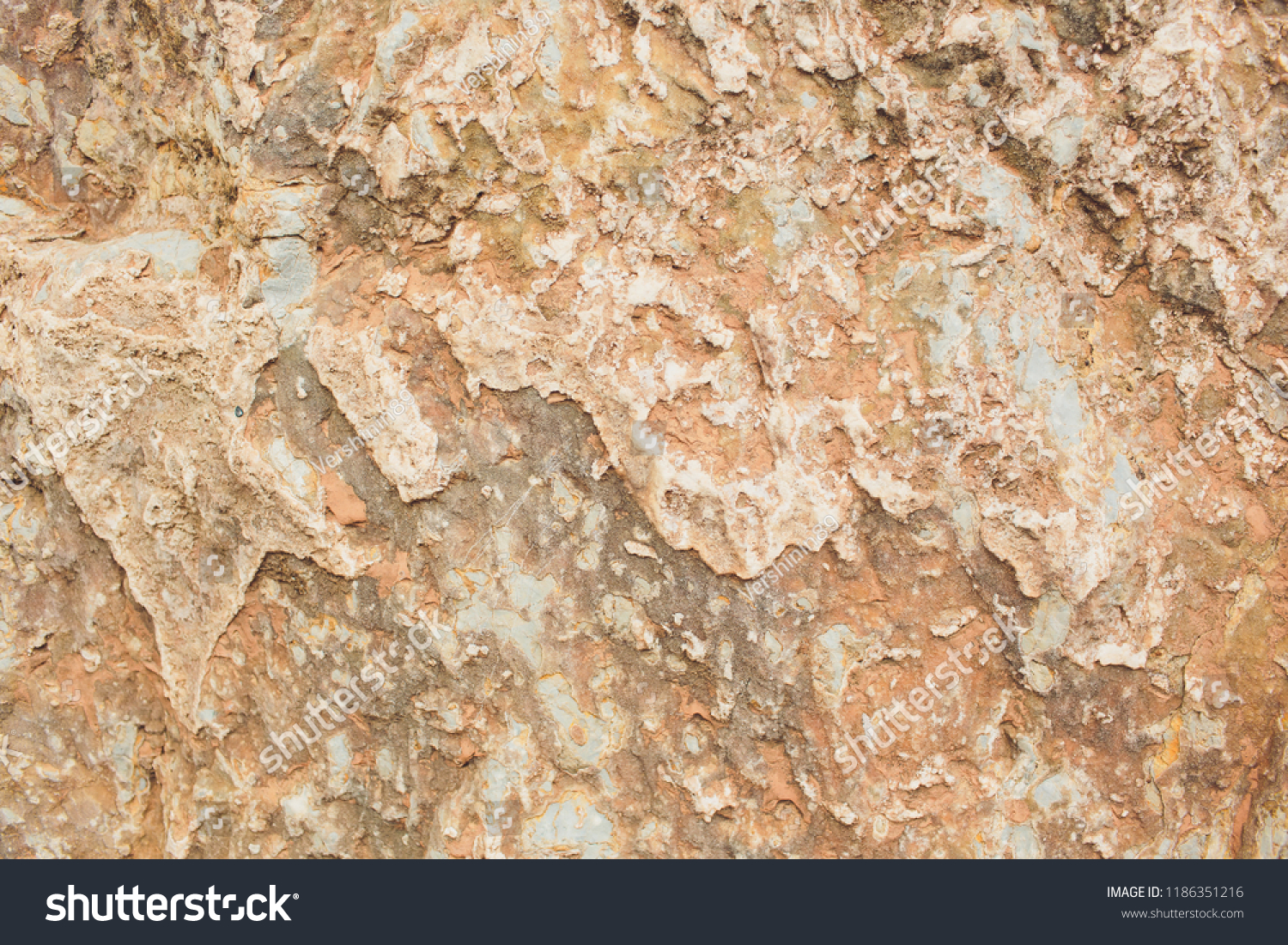 Rock layers - colorful formations of rocks stacked over hundreds of years. Interesting background with fascinating texture. #1186351216