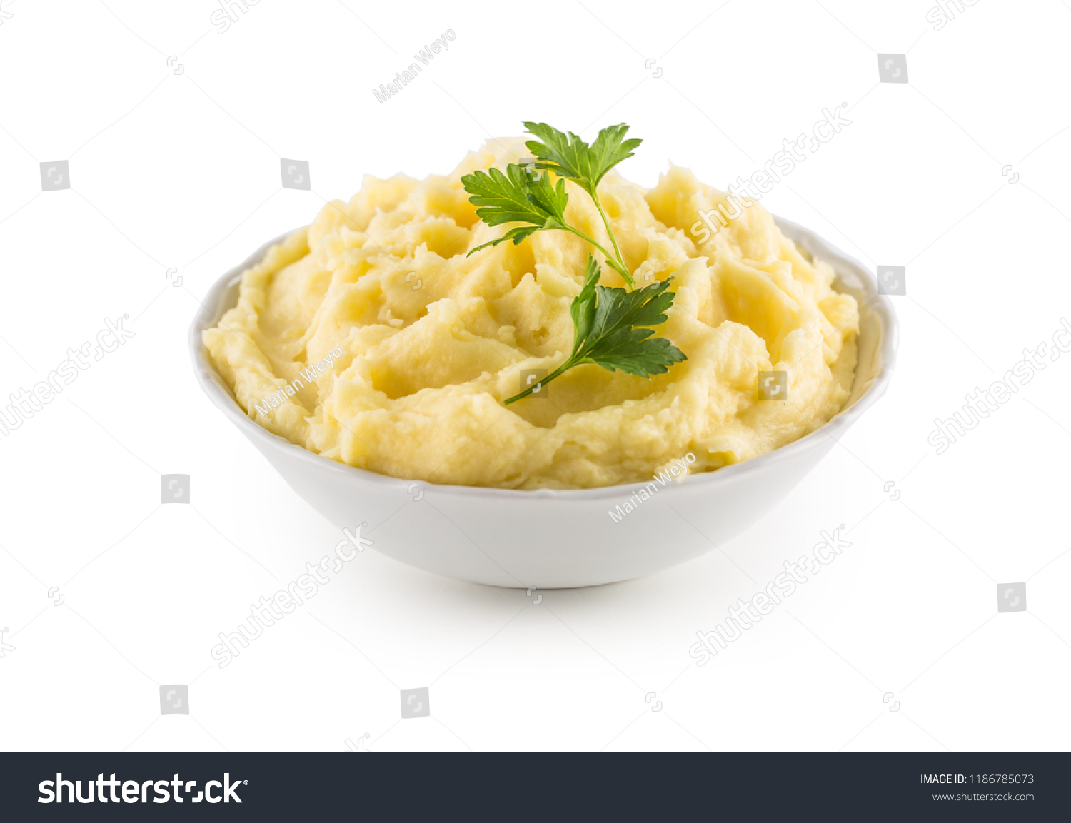 Mashed potatoes in bowl isolated on white background. #1186785073