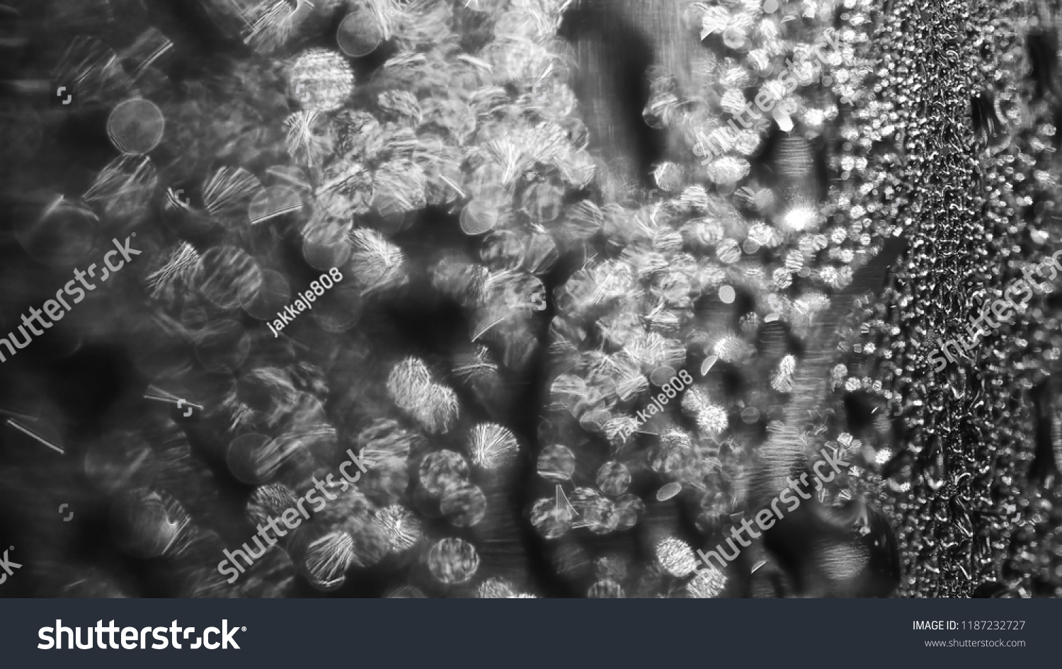 Blurred image, water drops bubbles and reflection on glass, abstract for background #1187232727
