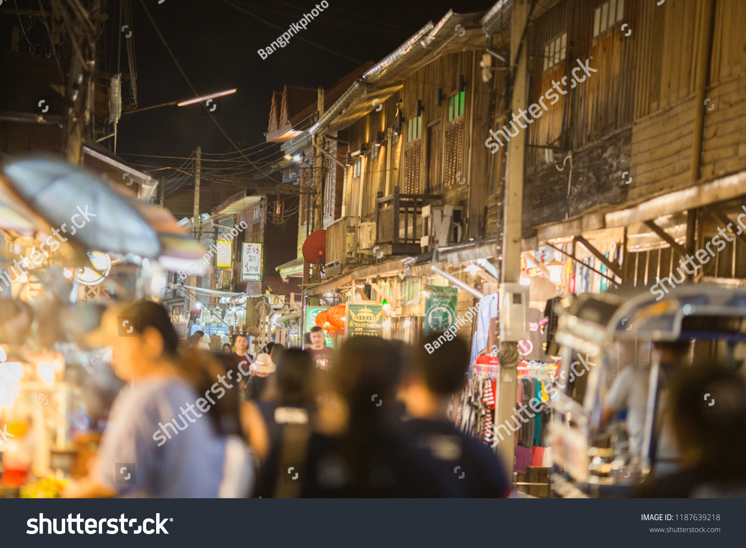 Loei: September 15, 2018, tourists go shopping at night at Chiang Khan Walking street, near Kaeng Khut Khu, a tourist attraction along the Mekong River, close to neighboring countries (Laos), Thailand #1187639218