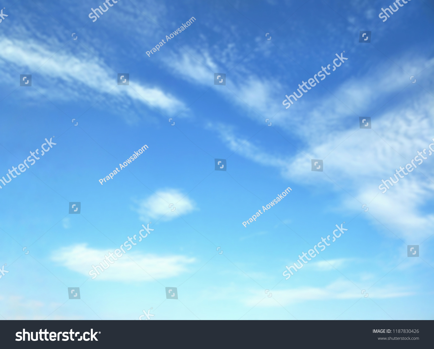 Blur image of clouds and blue sky for natural  background design in brightly and refreshing concept,low angle view with copy space  #1187830426