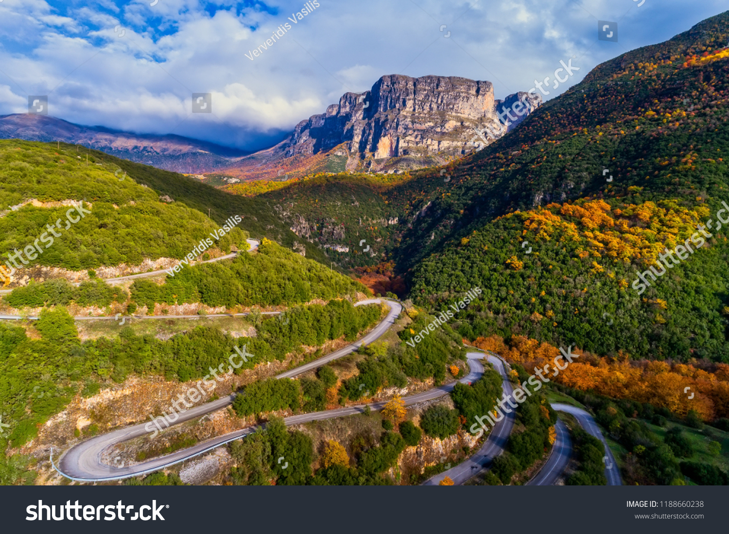 Aerial view of the the Vikos Gorge in the autumn and provincial road with many zigzag in the Epirus Zagorohoria, Greece. National park #1188660238