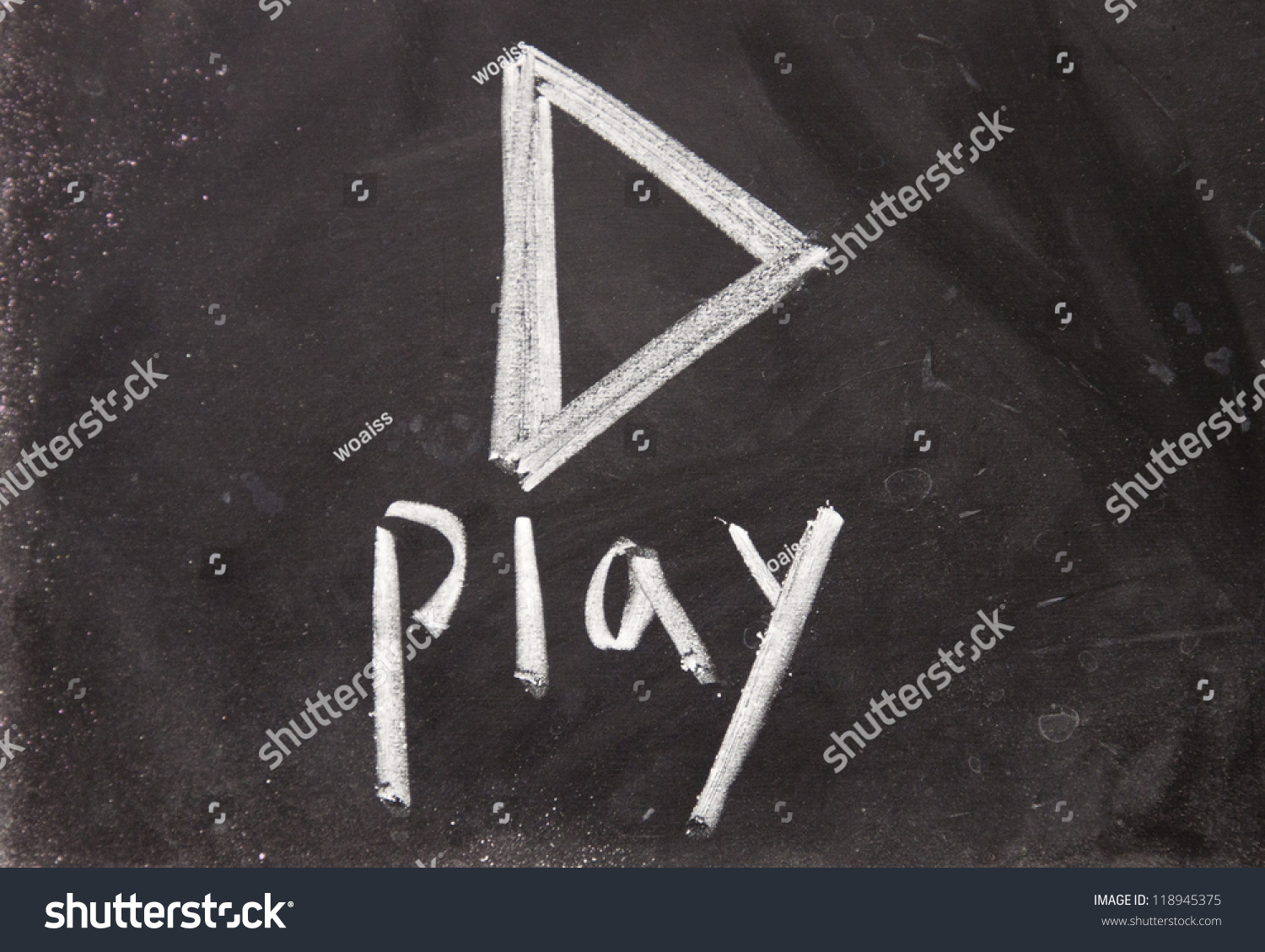 play sign drawn with chalk on blackboard #118945375