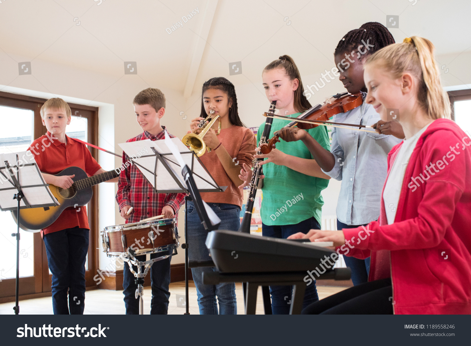 High School Students Playing In School Orchestra Together #1189558246