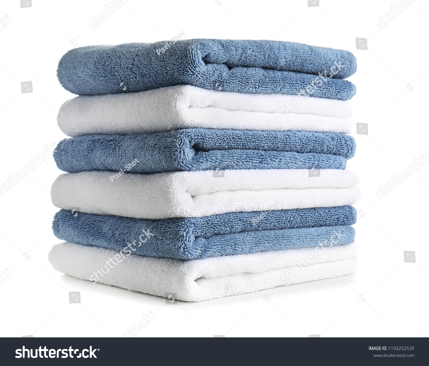 Stack of clean soft towels on white background #1193252539