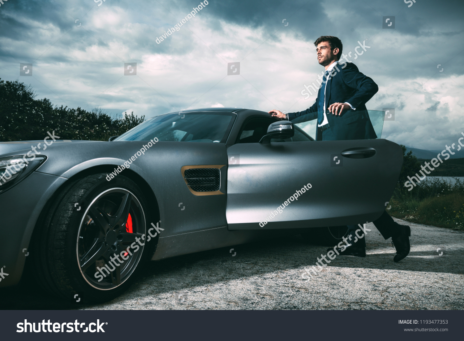 Business man in luxury car #1193477353