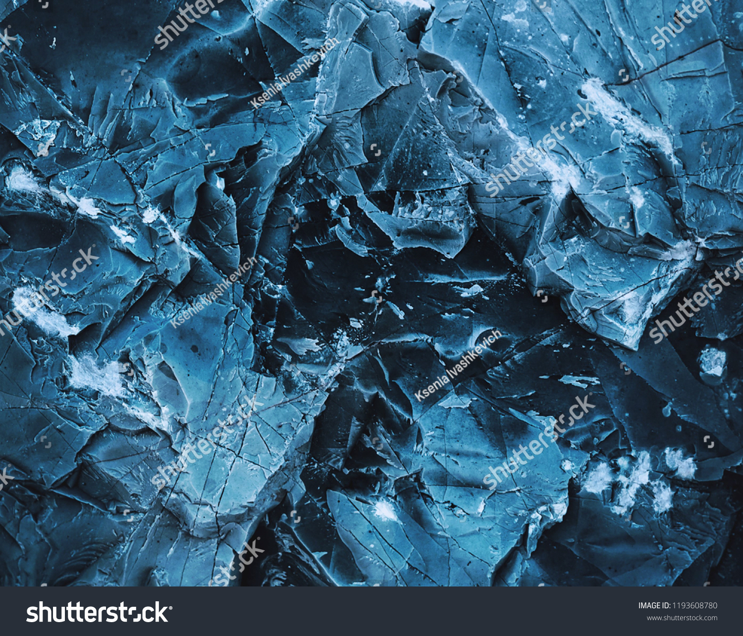 Splits in ice. Сool background. Ice cracks. Rock texture. Ice texture. Rough structure mineral. Stone background. #1193608780