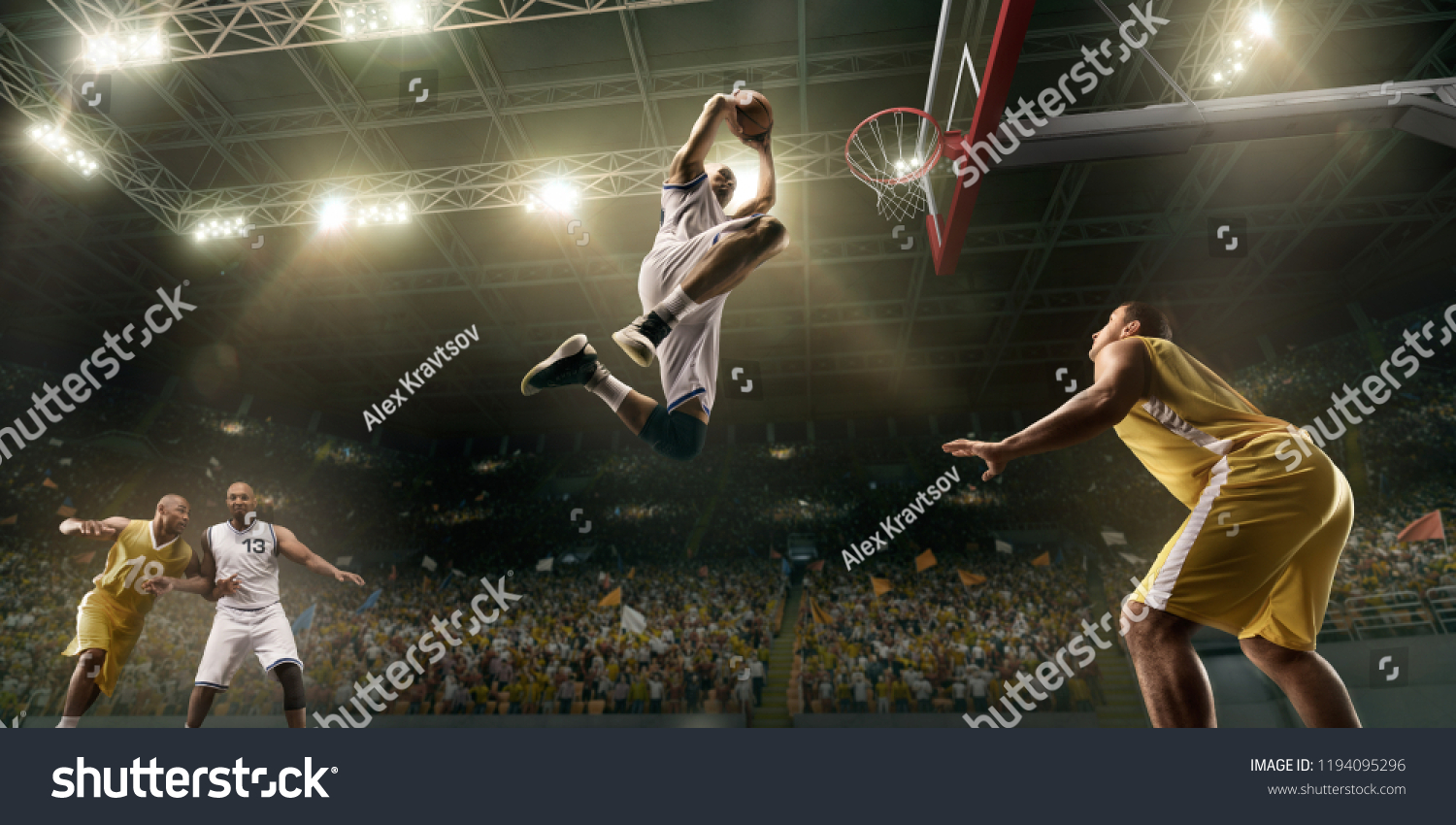 Basketball players on big professional arena during the game. Basketball player makes slum dunk #1194095296