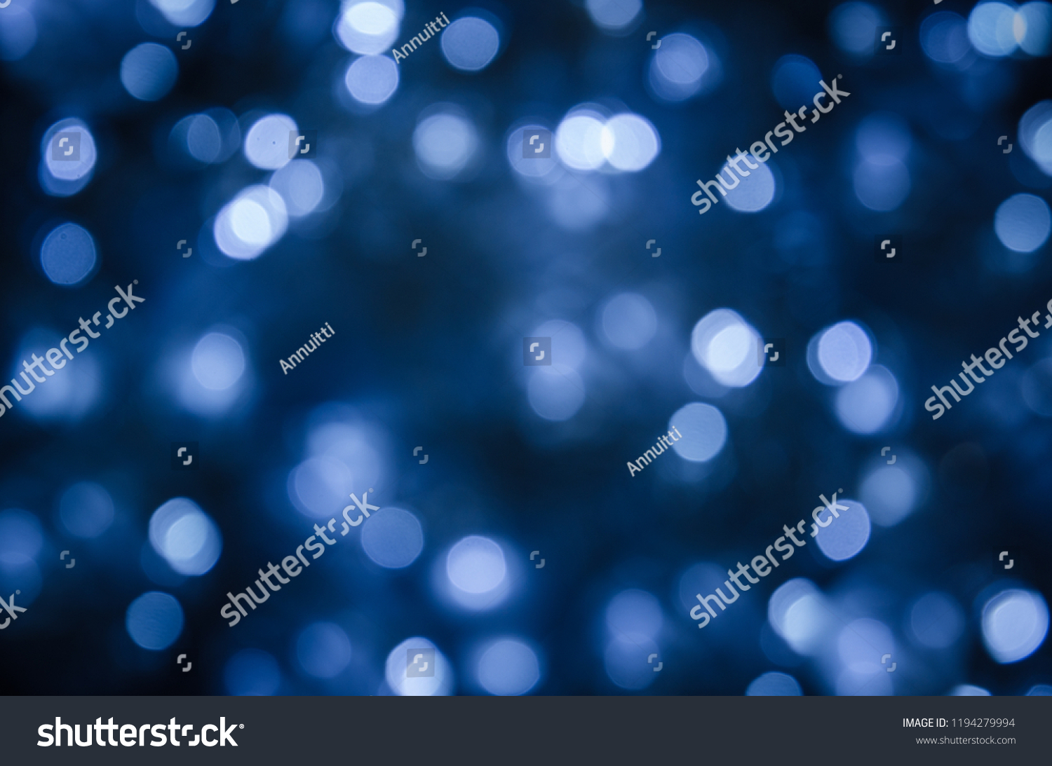 Abstract bokeh festoon on dark blue background #1194279994