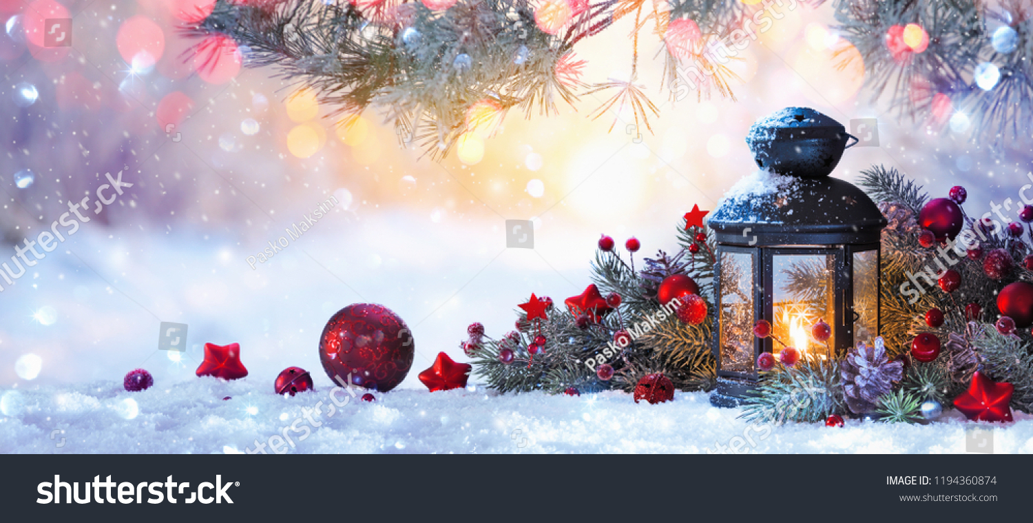  Christmas Lantern On Snow With Fir Branch in the Sunlight. Winter Decoration Background #1194360874
