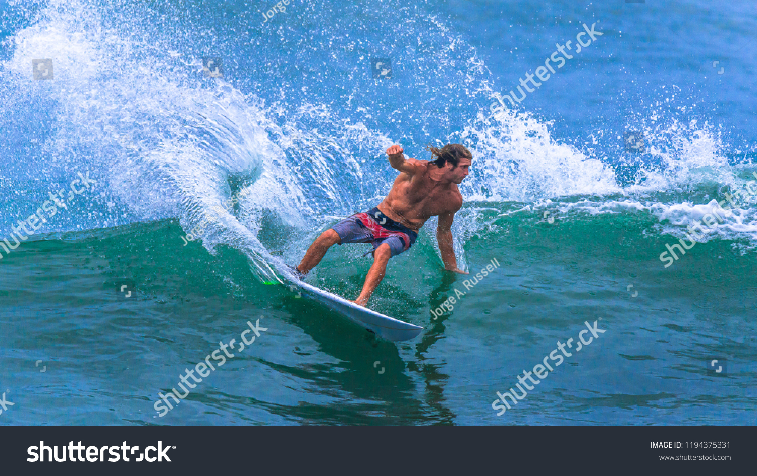 Riding the waves. Costa Rica, surfing paradise #1194375331