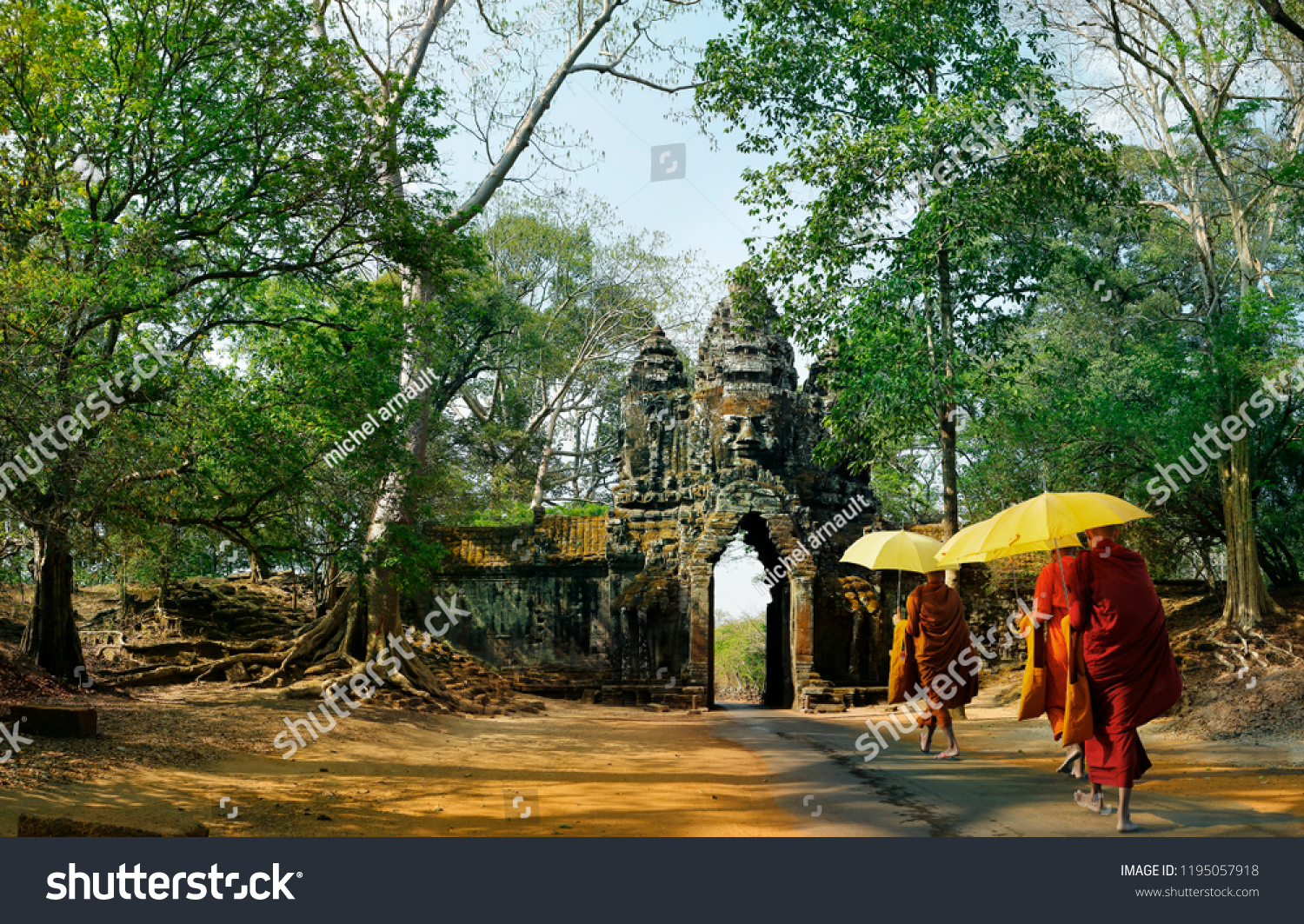 monks with umbrella walking in Angkor wat temple,Cambodia #1195057918