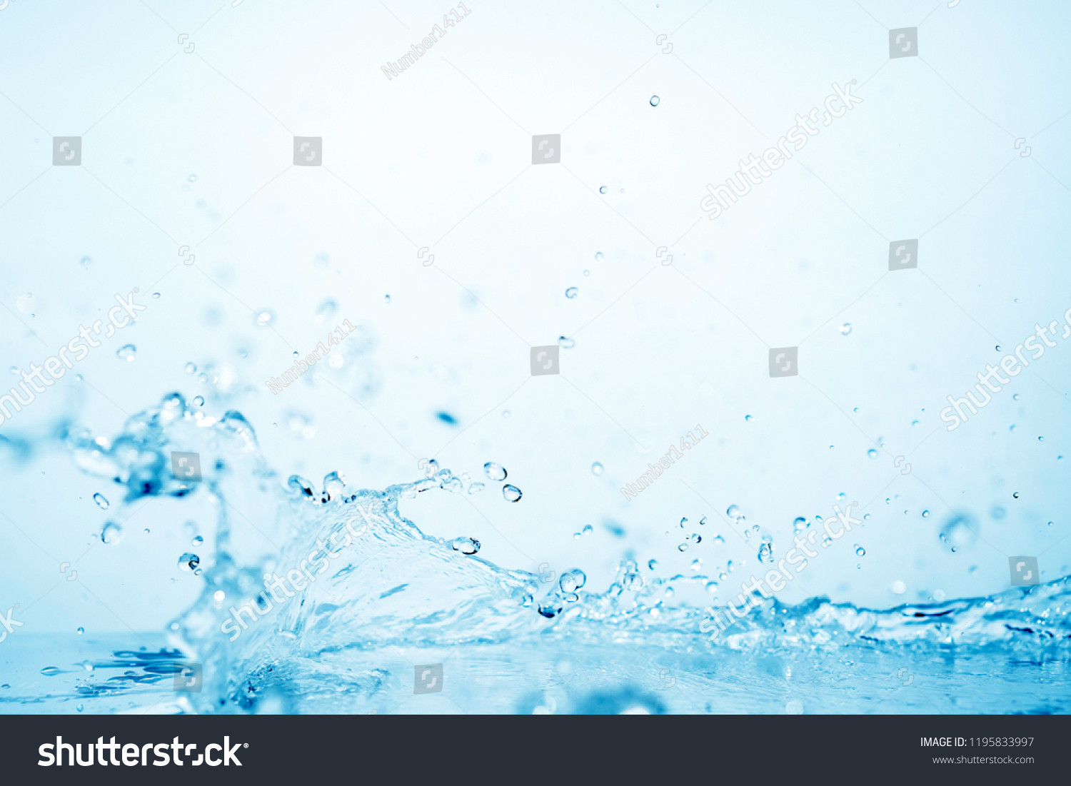 blue water splash on white background for abstract water concept #1195833997