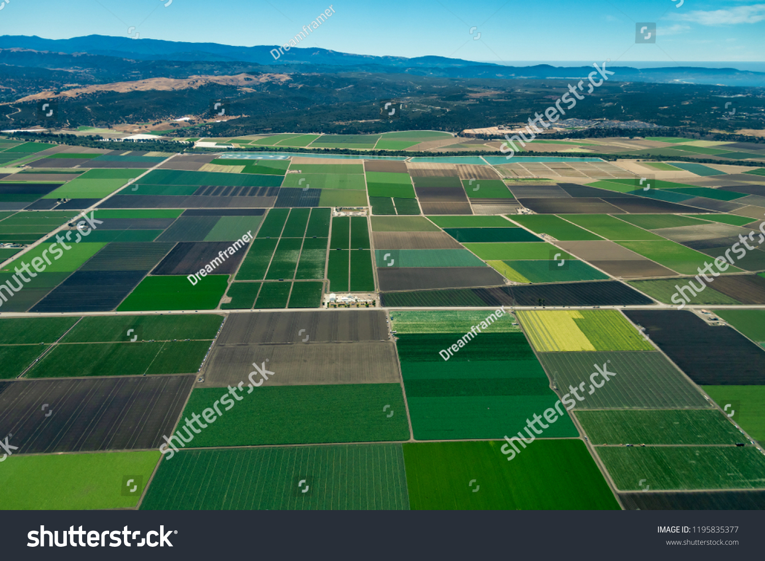Pacific coast of California with farmland close to the cities of Salinas and Monterey. The picture was taken in the early July. #1195835377